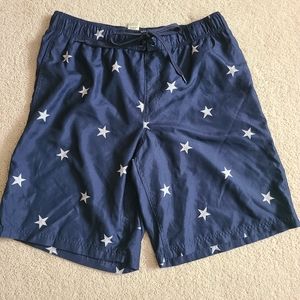 Faded Glory swim trunks. Dark blue with stars